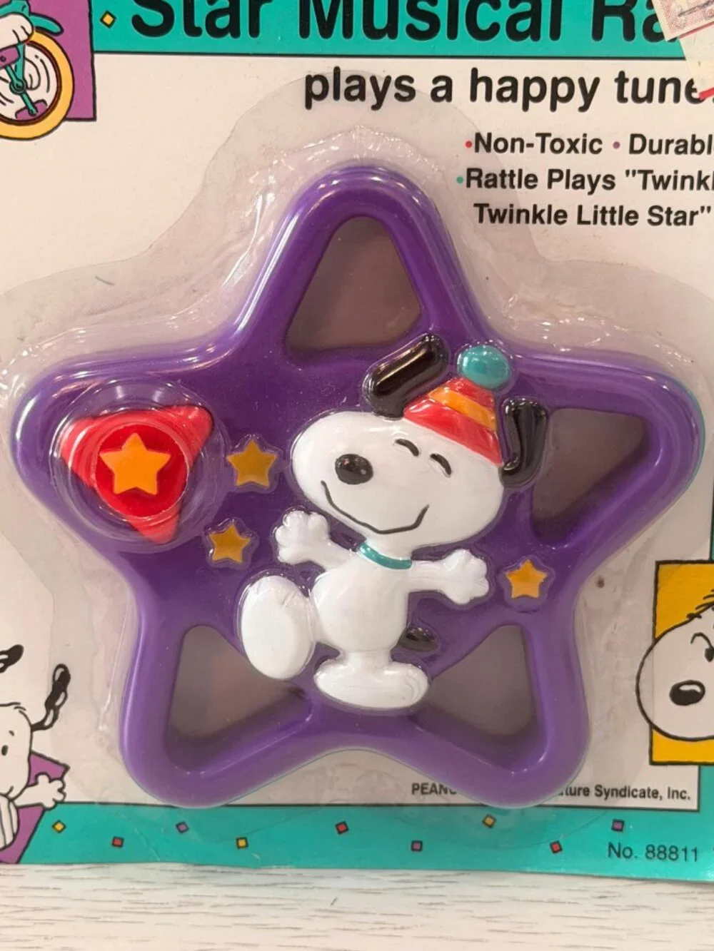 Vintage Peanuts Snoopy and the Daisy Hill Puppies Star Musical Rattle PURPLE